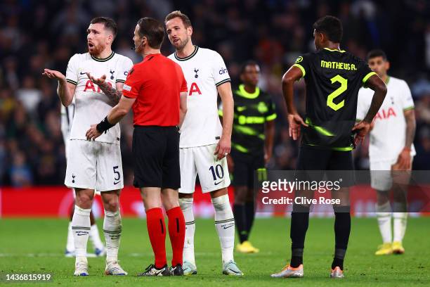 Pierre-Emile Hojbjerg and Harry Kane of Tottenham Hotspur surround referee Danny Makkelie after Harry Kane of Tottenham Hotspur has their goal...