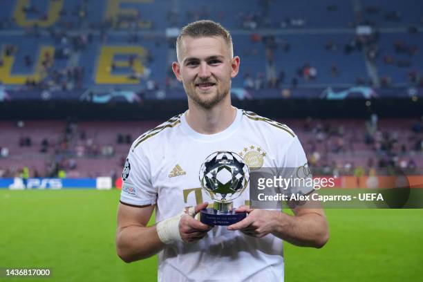 Matthijs de Ligt of Bayern Munich poses for a photo with the PlayStation Player Of The Match trophy after their sides victory during the UEFA...
