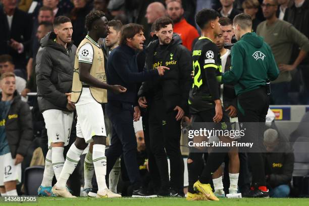 Antonio Conte, Manager of Tottenham Hotspur argues with Fourth Official Jochem Kamphuis during the UEFA Champions League group D match between...