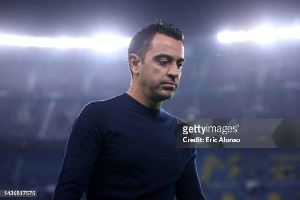 Xavi, Head Coach of FC Barcelona looks dejected following their side's defeat and elimination from the UEFA Champions League in the UEFA Champions...