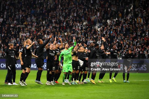 Players of Eintracht Frankfurt celebrates their side's win in front of their fans after the final whistle of the UEFA Champions League group D match...