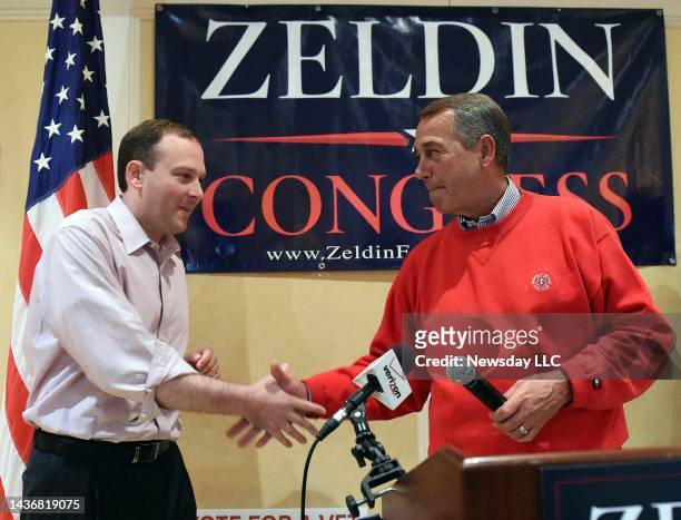 Congressional candidate Lee Zeldin, left, shakes hands with Speaker of the House John Boehner, right, during a campaign event at the Portuguese...