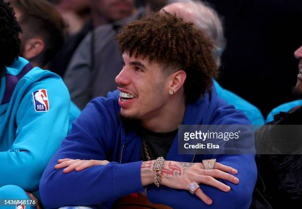 LaMelo Ball of the Charlotte Hornets looks on from the bench in the first half against the New York Knicks at Madison Square Garden on October 26,...
