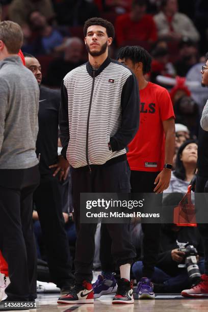 Lonzo Ball of the Chicago Bulls looks on against the Indiana Pacersduring the first half at United Center on October 26, 2022 in Chicago, Illinois....