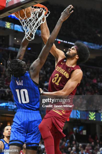 Jarrett Allen of the Cleveland Cavaliers dunks over Bol Bol of the Orlando Magic during the third quarter at Rocket Mortgage Fieldhouse on October...