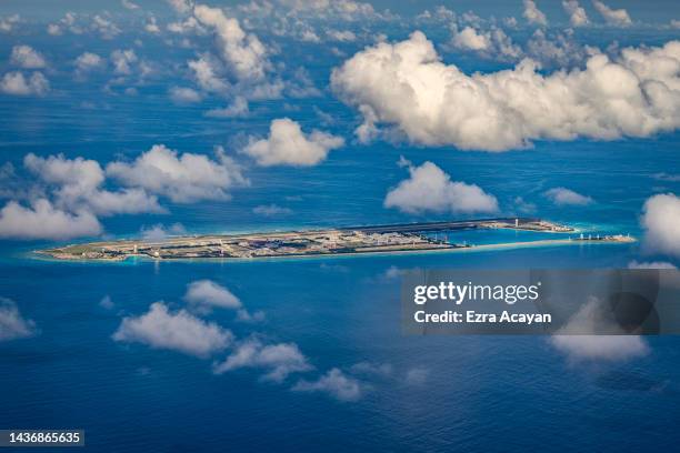 An airfield, buildings, and structures are seen on the artificial island built by China in Fiery Cross Reef on October 25, 2022 in Spratly Islands,...