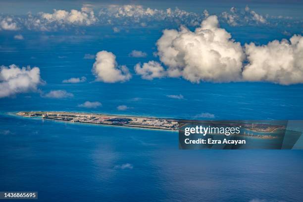 An airfield, buildings, and structures are seen on the artificial island built by China in Fiery Cross Reef on October 25, 2022 in Spratly Islands,...