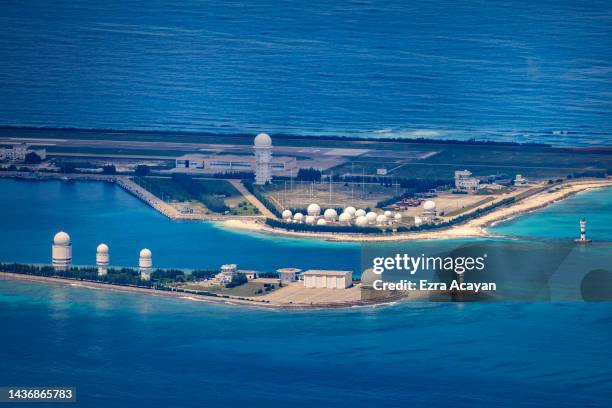 An airfield, buildings, and structures are seen on the artificial island built by China in Fiery Cross Reef on October 25, 2022 in Spratly Islands,...