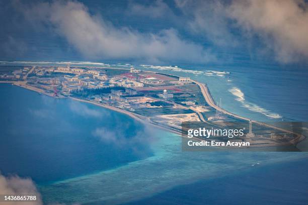 Buildings and structures are seen on the artificial island built by China in Subi Reef on October 25, 2022 in Spratly Islands, South China Sea. China...