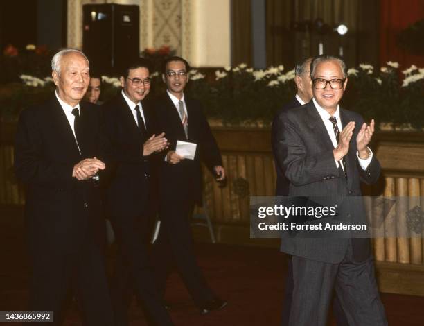 View of politicians Wan Li and Li Peng , with Chinese Premier Zhao Ziyang , at National Day reception, Great Hall of the People, Beijing, China,...