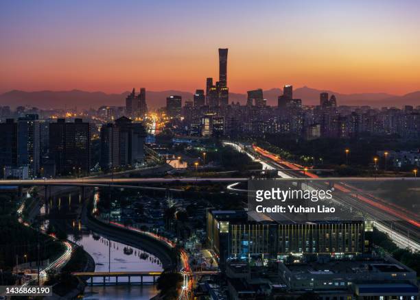 beijing cdb cityscape at night - 北京 stockfoto's en -beelden