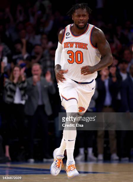 Julius Randle of the New York Knicks celebrates his shot in the fourth quarter against the Charlotte Hornets at Madison Square Garden on October 26,...