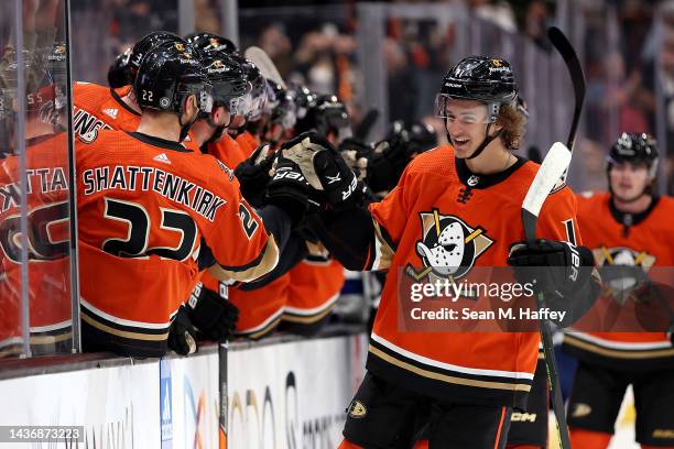 Trevor Zegras of the Anaheim Ducks is congratulated at the bench after scoring a goal during the first period of a game against the Tampa Bay...