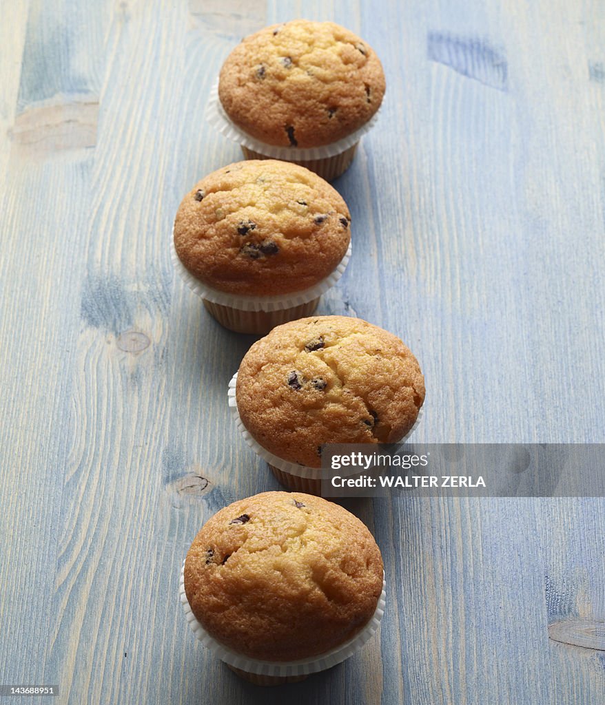 Close up of muffins on wooden table