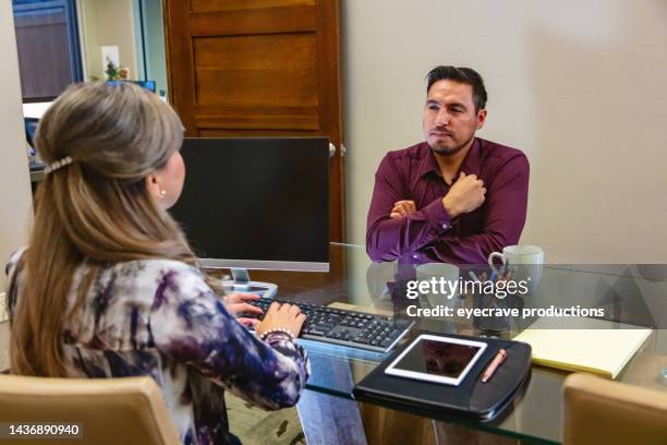 tax relationships in business office hispanic male client and female agent in meeting photo series - co director stock pictures, royalty-free photos & images