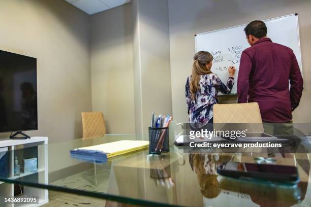 tax relationships in business office hispanic male client and female agent in meeting photo series - co director stock pictures, royalty-free photos & images