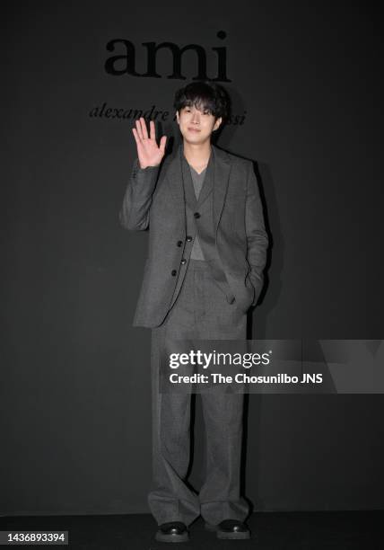 Choi Woo-sik attends the photocall of the Seoul Fashion Week SS 23 'AMI' Fashion Show at Gwanghwamun on October 11, 2022 in Seoul, South Korea.