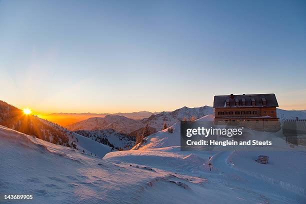 house on hill in snowy landscape - rotwand mountain stock pictures, royalty-free photos & images