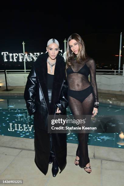 Kim Kardashian and Hailey Bieber attend as Tiffany & Co. Celebrates the launch of the Lock Collection at Sunset Tower Hotel on October 26, 2022 in...