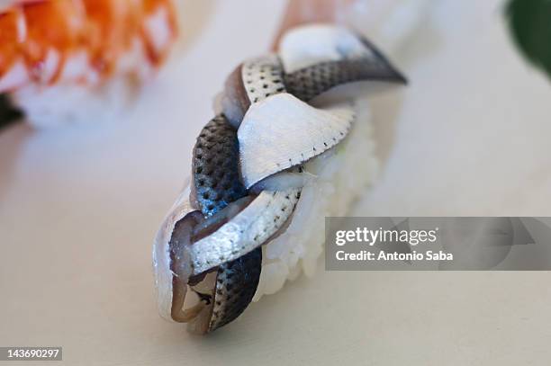 close up of ornate sushi - saba sushi stockfoto's en -beelden