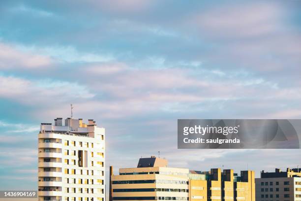 modern apartment buildings at sunrise - gijón imagens e fotografias de stock