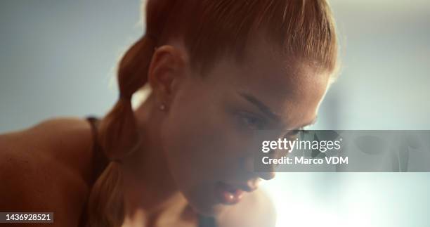 fitness, tired and face of woman in sports motivation, training and workout for intense exercising at the gym. closeup of exhausted female breathing break for recovery from cardio exercise for health - effort face stock pictures, royalty-free photos & images