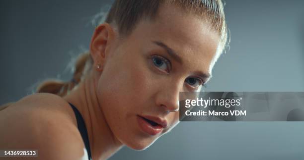 woman, face and exercise break, fitness and focus, strong athlete and motivation for sport and active lifestyle. rest during workout, breathe in portrait, sports and endurance training in the gym. - determination face stock pictures, royalty-free photos & images
