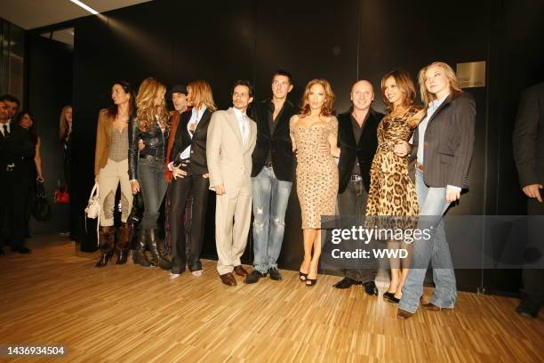 Elle Macpherson, Marc Anthony, Stefano Gabbana, Jennifer Lopez, Domenico Dolce, Jessica Alba and guests backstage at Dolce & Gabbana's fall 2006...