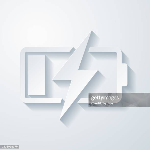 battery charging. icon with paper cut effect on blank background - wireless charging stock illustrations