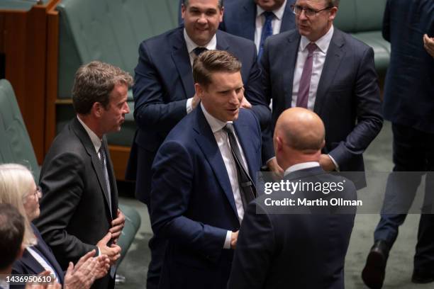 Andrew Hastie MP congratulates opposition leader Peter Dutton after delivering his budget reply speech at Parliament House on October 27, 2022 in...