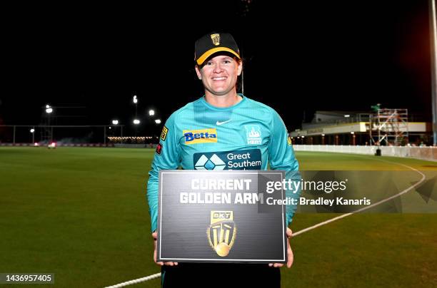 Jessica Jonassen of the Heat wins the 'Golden Arm' award during the Women's Big Bash League match between the Brisbane heat and the Adelaide Strikers...