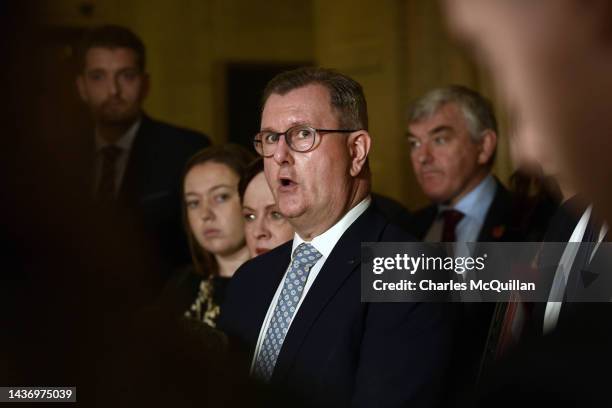 This image is a re-crop of image 1244263306) DUP leader Sir Jeffrey Donaldson speaks to the media alongside party members at Stormont on October 27,...