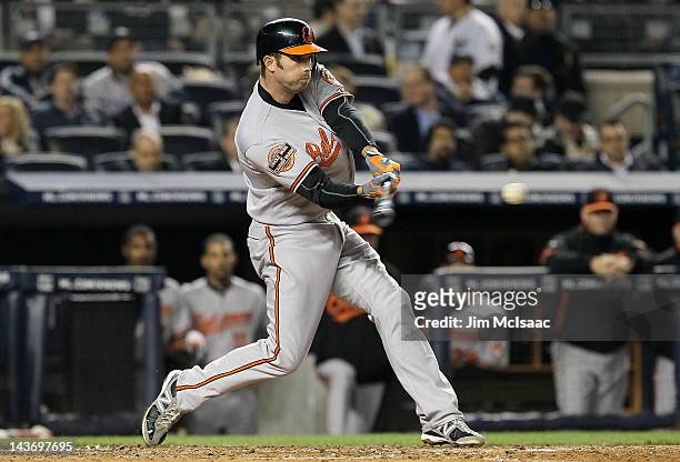 Hardy of the Baltimore Orioles connects on a fifth inning double against the New York Yankees at Yankee Stadium on May 2, 2012 in the Bronx borough...