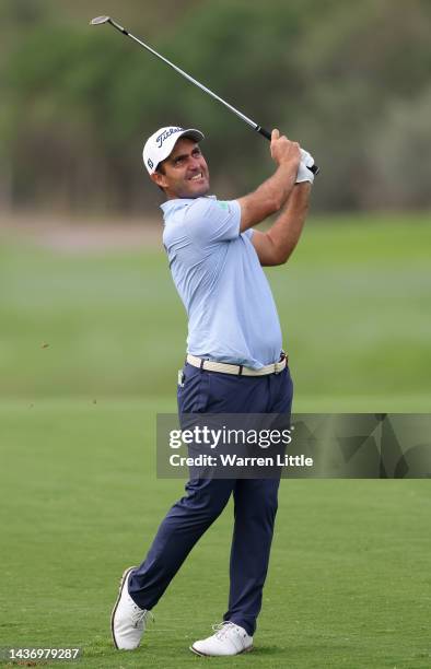 Edoardo Molinari of Italy plays his approach shot on the second hole during Day One of the Portugal Masters at Dom Pedro Victoria Golf Course on...