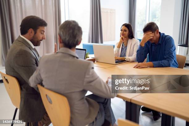 business people at the meeting - legal problems stock pictures, royalty-free photos & images
