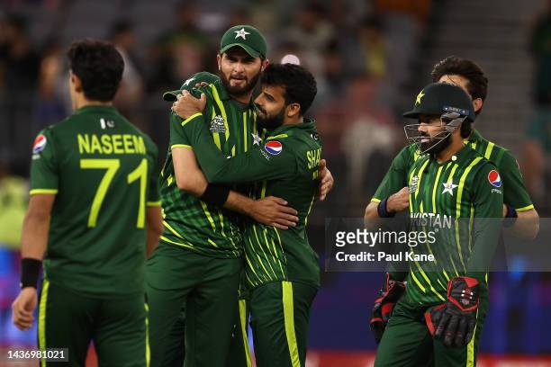Shaheen Afridi and Shadab Khan of Pakistan celebrate the wicket of Milton Shumba of Zimbabwe during the ICC Men's T20 World Cup match between...