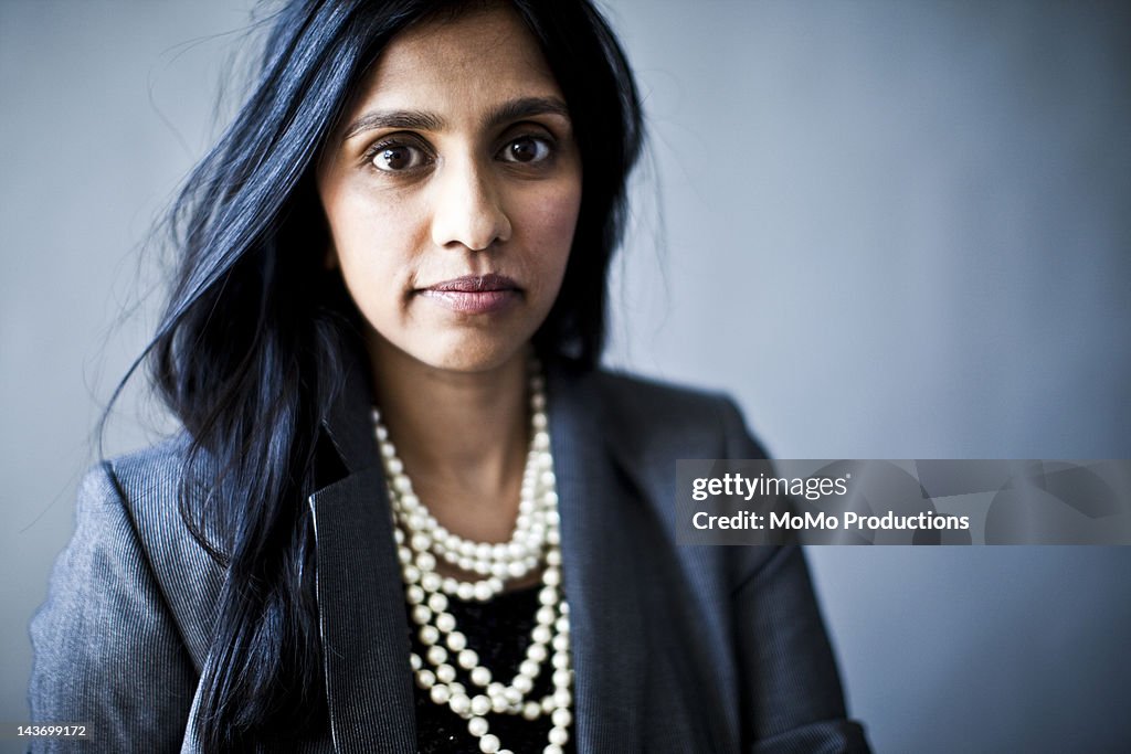 Studio portrait of business woman