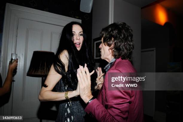 Designer L\'Wren Scott and musician Mick Jagger attend a dinner celebrating Scott\'s spring 2010 collection at Norwood.