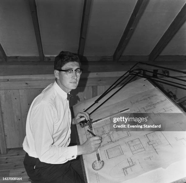 British rower and architect Simon Crosse working on an architectural drawing on July 26th, 1960. Crosse rowed for Great Britain in the men's coxed...