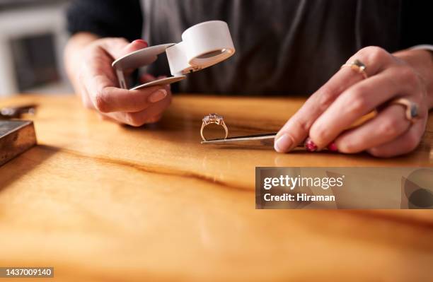 jeweler, diamond ring and magnifier, hand inspect jewellery and jewel appraisal in workshop or store closeup. worker with tool, quality check at desk and working, luxury and retail industry. - caixa de joias imagens e fotografias de stock