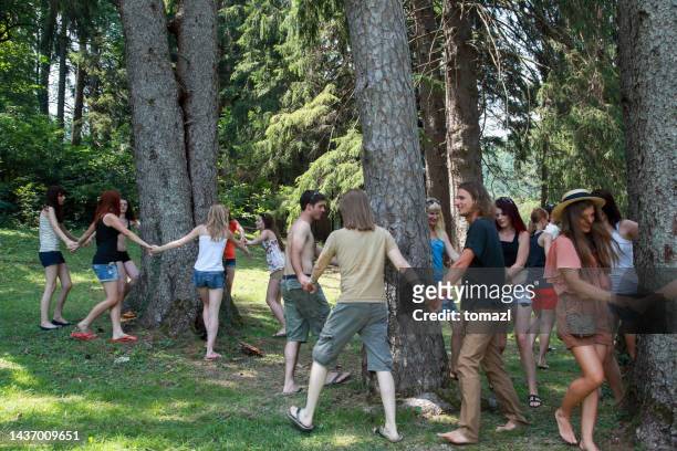 environmental protest of young people - tree hugging stock pictures, royalty-free photos & images