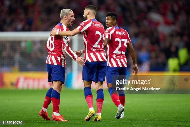Yannick Carrasco of Atletico Madrid celebrates with Antoine Griezmann after scoring their team's first goal during the UEFA Champions League group B...