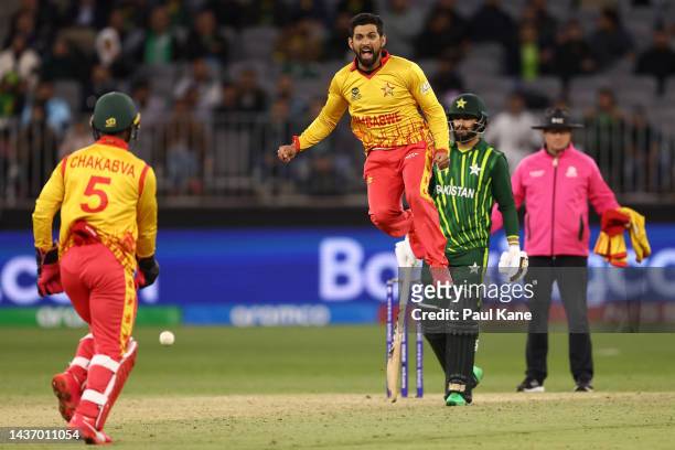 Sikandar Raza of Zimbabwe celebrates the wicket of Shan Masood of Pakistan during the ICC Men's T20 World Cup match between Pakistan and Zimbabwe at...