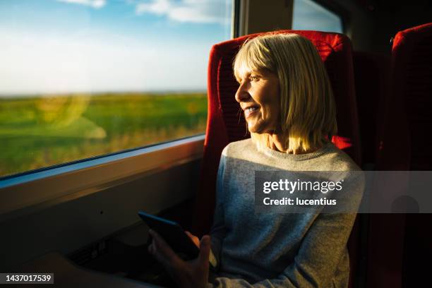 train journey - reflection in train window stock pictures, royalty-free photos & images