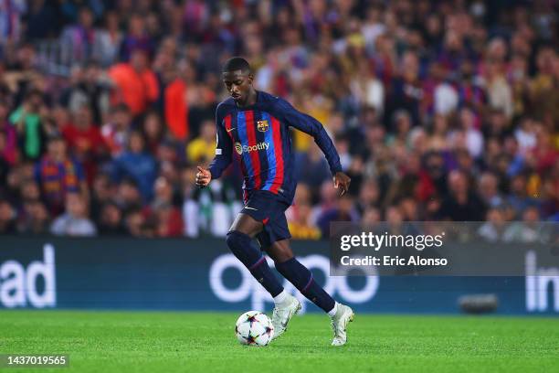 Ousmane Dembele of FC Barcelona runs with the ball during the UEFA Champions League group C match between FC Barcelona and FC Bayern München at...