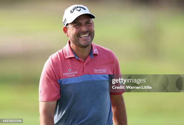 David Howell of England looks happy as he makes his 707th apperance on tour during Day One of the Portugal Masters at Dom Pedro Victoria Golf Course...
