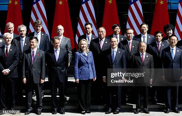 Front row U.S. Commerce Secretary John Bryson, U.S. Ambassador to China Gary Locke, U.S. Treasury Secretary Timothy Geithner, U.S. Secretary of State...