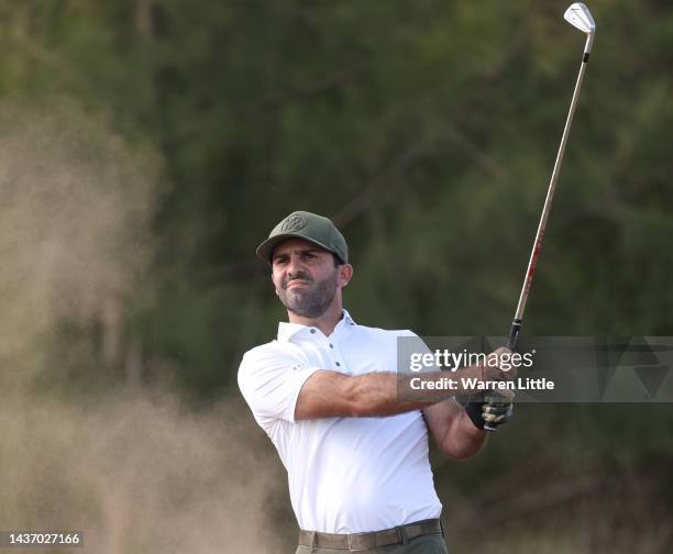 Joel Stalter of France plays his approach shot on the ninth hole during Day One of the Portugal Masters at Dom Pedro Victoria Golf Course on October...