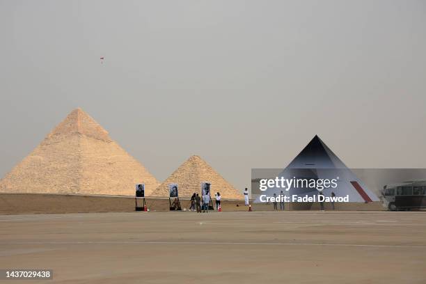 French photographer and street artist JR's artwork "Inside Out Giza", is displayed at the Giza pyramids necropolis during the second edition of the...