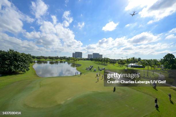 General view is seen team Captain Brooks Koepka of Smash GC, former U.S. President Donald Trump, Eric Trump and Kai Trump play the seventh green...